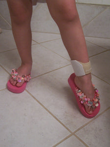 ministrap worn around ankle of child