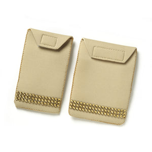 beige pockets set decorated with 3 row gold tone ribbon