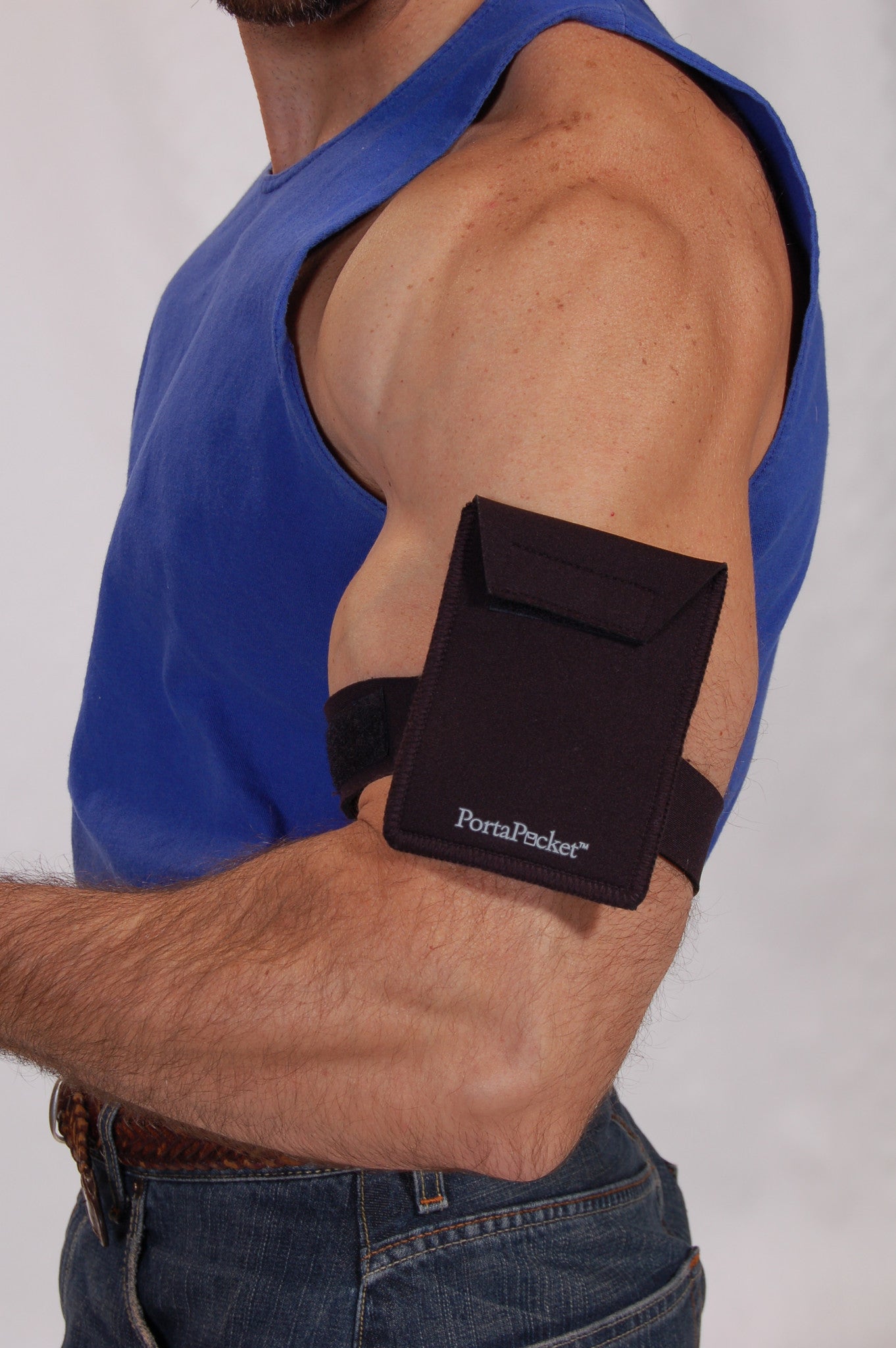 Large black PortaPocket pocket on arm makes sense at gym to hold your smartphone and valuables