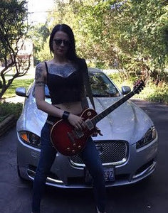 gal with portapocket to fit guitar picks and mic pack