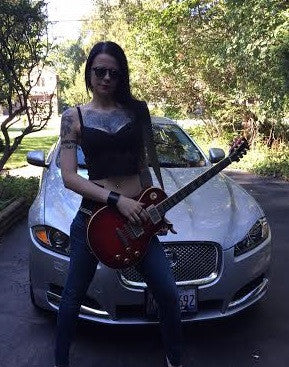 gal with portapocket to fit guitar picks and mic pack